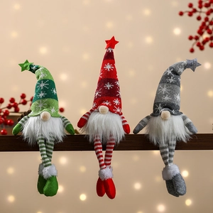 Three glowing faceless Christmas gnomes with star hats on wooden beam with bokeh lights