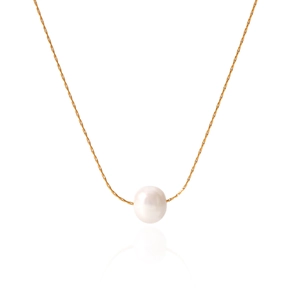 Detail of a vintage-style freshwater pearl pendant on a delicate gold stainless steel chain