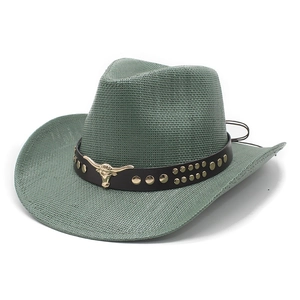 Greyish green straw western cowboy hat with a gold bull head emblem and leather trim