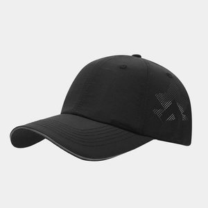 Detail of black quick-dry baseball cap featuring star-shaped laser perforations for airflow