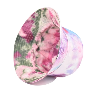 Detailed close-up of colorful tie-dye bucket hat showing cotton fabric and floral patterns