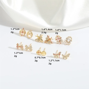Golden stud earring set featuring bee, butterfly, and tree designs with zircon accents