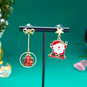 Asymmetric Christmas earrings with Santa Claus and gift box pendants on a gold finish