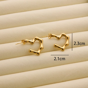 Detailed view of heart-shaped gold wave earrings measuring 2.3cm by 2.1cm size