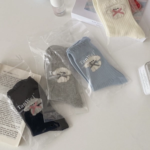 Cute cartoon puppy embroidery crew socks with bows in cream, blue, and grey multipack