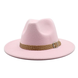 Detail of pink wool fedora hat featuring a brown leather woven belt with silver buckle