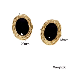 Detail showing 22mm x 18mm vintage 18K gold plated oval earrings with black stone