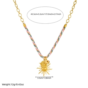 Gold sunflower pendant necklace with colorful braided cord and chain details