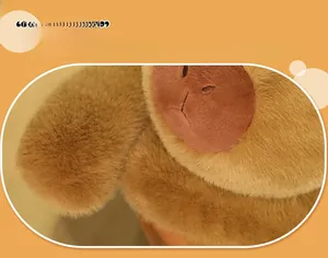 Close-up of soft brown capybara plush toy showing fluffy texture and full stuffing