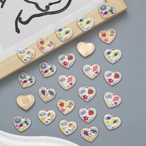 Colorful heart-shaped eye charms with gold edges for DIY jewelry making and crafts