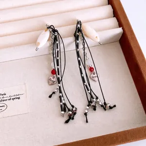 Bohemian silver needle shell beaded earrings with heart Love pendant and tassel detail