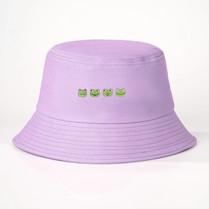 Detail of light purple cotton bucket hat featuring four cute green frog embroidery