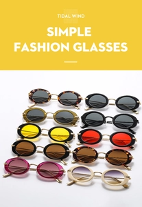 Collection of vintage oval sunglasses in various colors with thick acetate frames