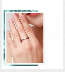 Detail of sterling silver ring featuring colorful micro-paved cubic zirconia gems