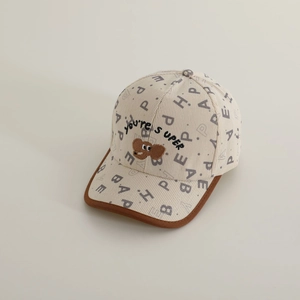 Close-up of corduroy kids baseball cap with letter print and elephant embroidery detail