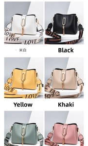 Detail view of stylish bucket bag set with wide LOVE straps and elegant tassels in six colors