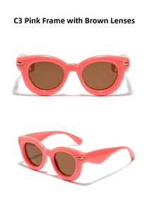 Detail of retro cat-eye sunglasses model C3 with pink frame and dark tea lenses