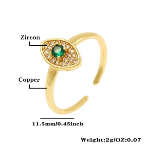 Detail of evil eye ring showing micro-set green zircon and 18K gold-plated copper