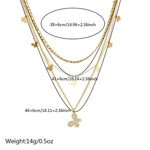 Three-layer gold-plated stainless steel necklace with shell butterfly pendants on white background