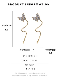 Detail showing dimensions of butterfly chain earrings with blue zircon in gold