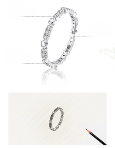 Close-up of S925 sterling silver heart ring with 5A grade hand-set zircon details