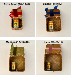 Set of 4 handmade woven straw gift boxes with ribbons in sizes 10cm to 20cm