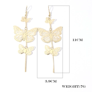 Detailed size view of long gold butterfly earrings measuring 11cm by 3.9cm at 7g weight