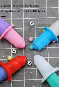 Close-up of flexible silicone leak-proof covers for travel bottles in four colors
