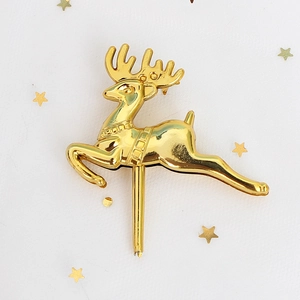 Golden reindeer cake topper with mirror finish and star decoration for Christmas parties
