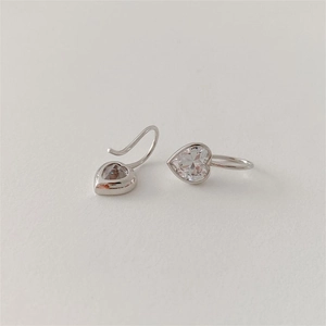 Elegant 925 sterling silver heart-shaped cubic zirconia dangle earrings on white background