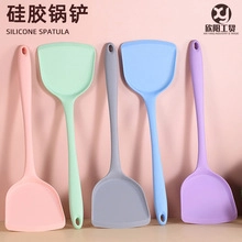 Detailed view of colorful heat resistant silicone spatulas with hanging holes