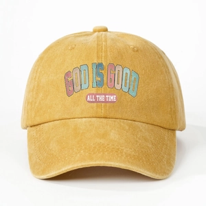Vintage mustard yellow washed cotton baseball cap with God Is Good printed text