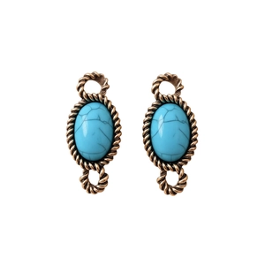 Vintage bronze resin oval earrings with turquoise stone in an ethnic weave pattern