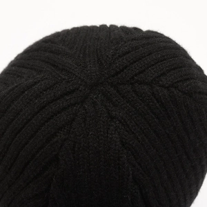Black ribbed knit beanie with thick thermal material and reinforced top stitching details