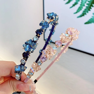 Sparkling crystal headbands in navy blue and champagne pink with rhinestone details