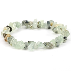 Detailed close-up of natural irregular green stone beads on a stretch bracelet band