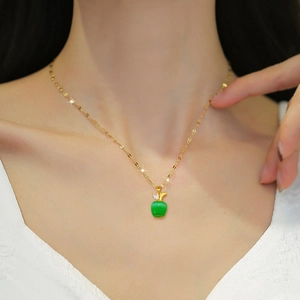 Titanium steel gold necklace with green opal apple pendant and crystal accents for women