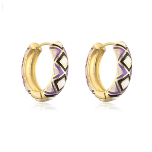 Detailed macro view of gold hoop earrings with purple and white diamond enamel patterns