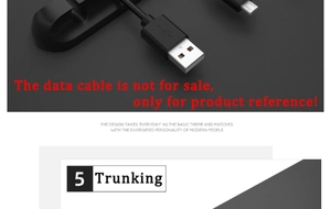 Detailed view of black 5-slot cable organizer showing USB cord management on a desk surface