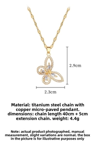 Detail view of hollow butterfly pendant with white zircons and dimensions marked