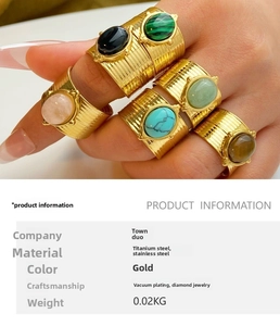 Set of bohemian gold wide rings with natural stones like malachite and turquoise