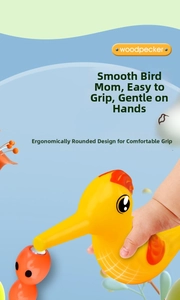 Close-up of ergonomic woodpecker toy with smooth surface for a comfortable hand grip