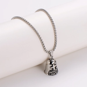 Vintage stainless steel motorcycle bell pendant with cross and anchor on white stand