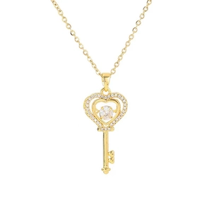 Golden heart key pendant necklace with shimmering crystals on a minimalist chain