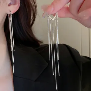 Elegant long silver tassel earrings with heart hooks and metal chains for women