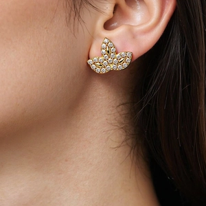 Elegant gold three-leaf clover stud earrings with sparkling white cubic zirconia stones