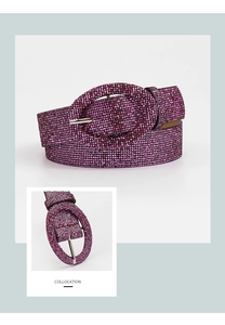 Close-up of pink glittery PU leather belt with sparkly rhinestones and oval buckle