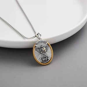 Vintage oval St. Michael shield pendant necklace in silver and gold bicolor finish