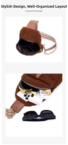 Detail showing the organized interior compartments of the brown sherpa crossbody bag