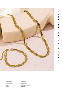 Detail of 18K gold plated double-strand twisted snake chain necklace and bracelet set